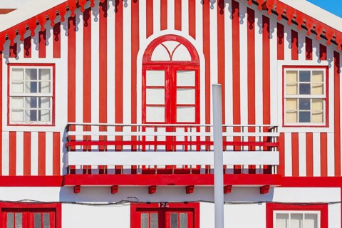 Brightly painted beach home facade, Costa Nova do Prado, Aveiro, Portugal, Europe