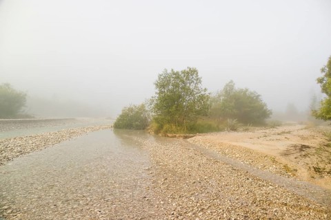 Isar valley nature conservancy area. The wild Isar river flows through its gravel bed past