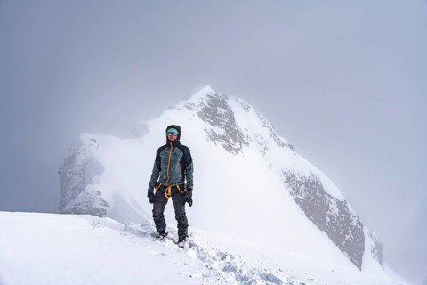 Ski tourers climbing the Wildhorn, Snowy mountain landscape and fog, Bernese Alps, Bernese