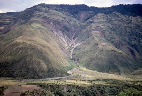Andean mountain river valley with alluvial fan, near Baños de Agua Santa, Ecuador, Tungurahua