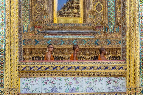Wat Phra Kaeo temple, royal palace. Royal chapel with Buddhist monks and novices. Bangkok,