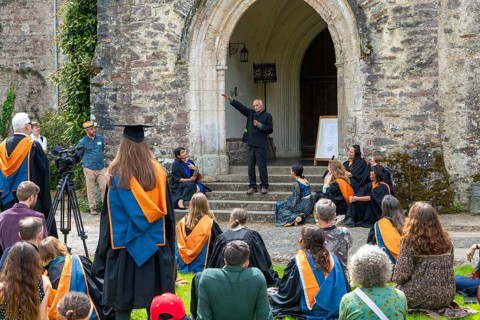 Satish Kumar speaking at graduation event, Schumacher College, Dartington Hall estate, Totnes,