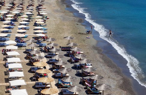 Parasols on Agia Galini beach, Agia Galini, south coast, Crete, Greece, Europe