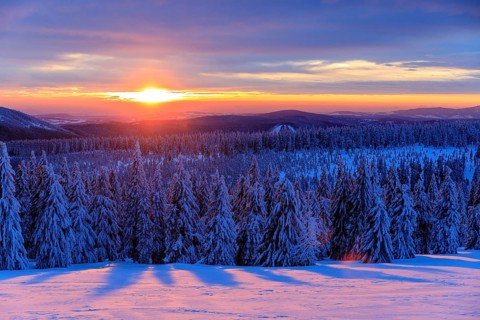 Sunset and winter landscape at the Wossecker Baude above Harrachsdorf in the Giant Mountains, Czech