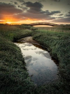 Sunrise at the Lügenbrücke bridge near Keitum on Sylt, North Frisia, Schleswig-Holstein, Germany,