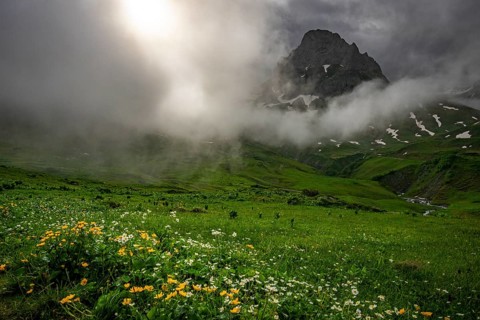 Peaks in the morning light and alpine landscape with dramatic clouds, Lech, Lechquellengebirge,