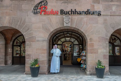 Life-size statue of Pope Francis in front of the Paulus bookshop, Nuremberg, Middle Franconia,