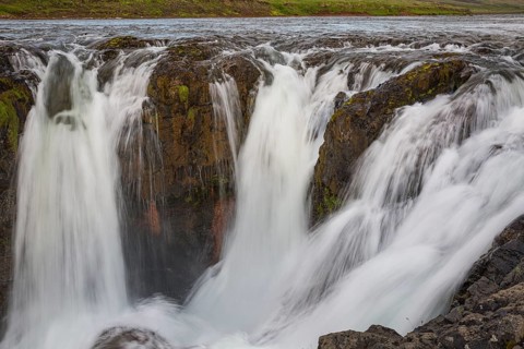The Kolufossar waterfalls of the river Vididalsa consists of 3 falls the upper fall Efrifoss, in