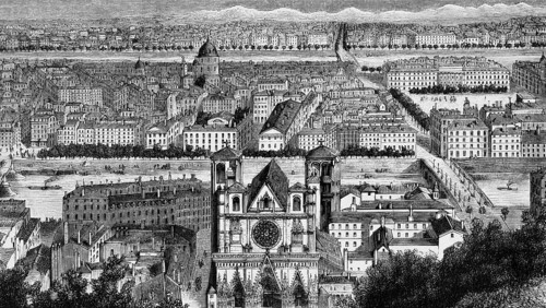 City view of Lyon on the Rhone, west side of the cathedral with rose window and double tower,