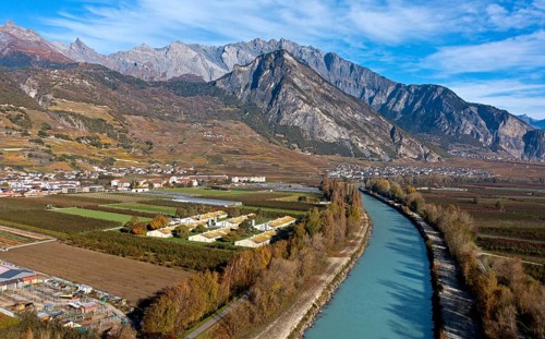 The valley of the Rhone, view upstream towards Leytron and the Haut de Cry massif, Riddes, Valais,