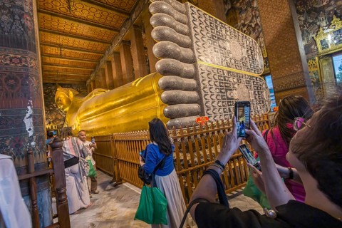 Wat Pho, temple of the reclining Buddha. Sightseeing attraction, architecturally significant temple