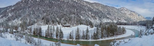 Isar valley in winter at temperatures of minus 18 degrees Celsius. Snow covered landscape with the