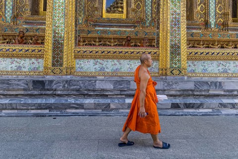 Wat Phra Kaeo temple, royal palace. Royal chapel with Buddhist monks and novices. Bangkok,