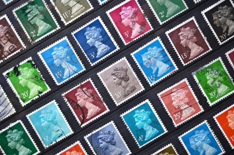 Old British postage stamps depicting the queen Elizabeth II