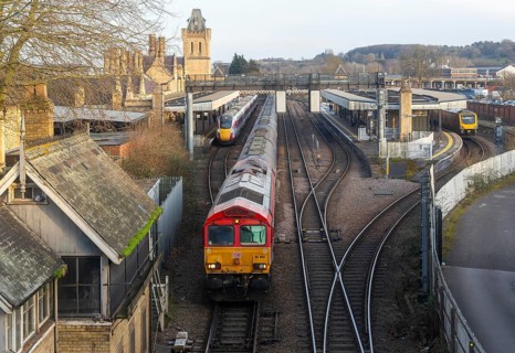 EMR British Rail Class 66 freight train and LNER Class 801 Azuma passenger train, Lincoln railway