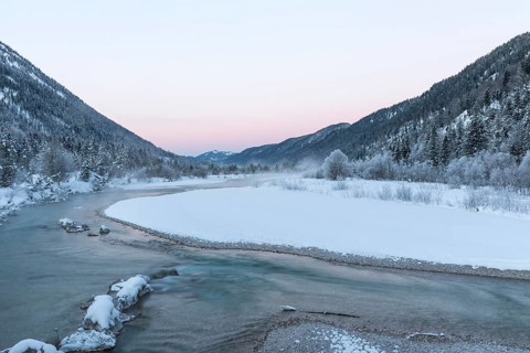Isar valley in winter at temperatures of minus 18 degrees Celsius. Snow covered landscape with the