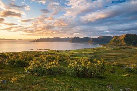 View of the coast and mountains from Mount Hoven, Gimsoy, Lofoten, Norway, Europe