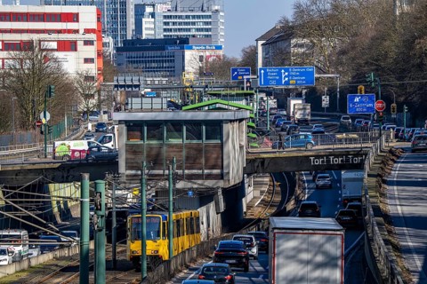 Motorway A40, Ruhr expressway, heavy traffic jam, rush hour, city passage in Essen, skyline of the