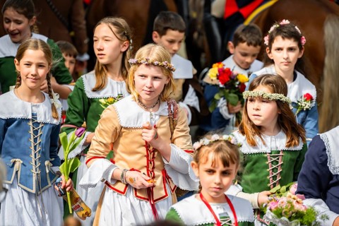 Children at the parade of historically costumed guildsmen, Sechseläuten or Sächsilüüte, Zurich