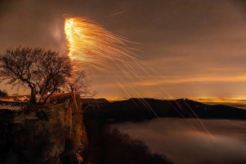 New Year's Eve fireworks 2024, on the Breitenstein, Swabian Alb near Ochsenwang. Sea of fog in the