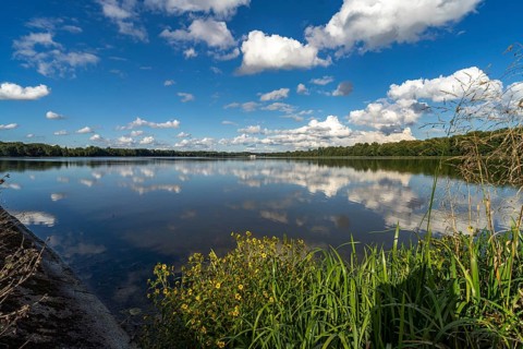 Clouds reflected in the Danube reservoir Faimingen, Lauingen Donau, Bavaria, Germany, Europe