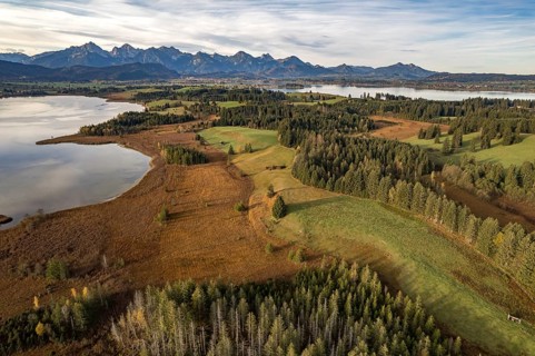 The Allgäu with Bannwaldsee, Forggensee and the Alps seen from the air, Schwangau, Allgäu, Bavaria,