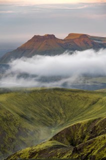 Fog between mountains, moss-covered volcanic mountain landscape, at sunset, Pakgil, Iceland, Europe