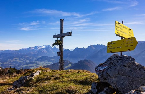 Old summit cross on the Schwarzer Berg with a view of the Dachstein massif, Golling,
