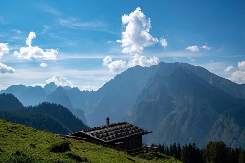 Rustic alpine hut on the Priesbergalm with a view of the Watzmann, Berchtesgaden National Park,