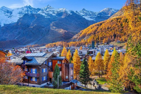 View of the village with Dom 4545m and Täschhorn 4491m of the Mischabel group in autumn, Saas-Fee,