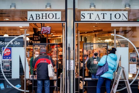 Cologne, North Rhine-Westphalia, Germany - Click and Collect in a bookshop, retail in times of the