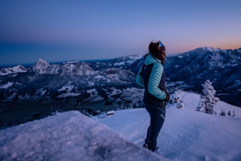 Hiking in the snow in the snow-covered winder landscape in the Alps at Neunerköpfle in the