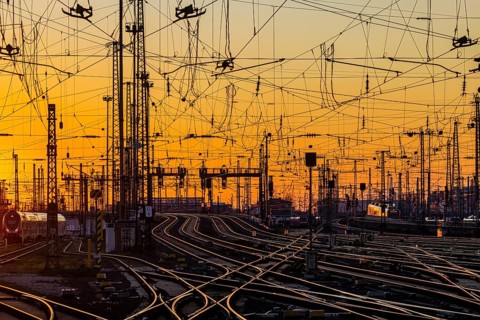 Track apron with trains, rails, points, pylons and signalling systems. Infrastructure at the main