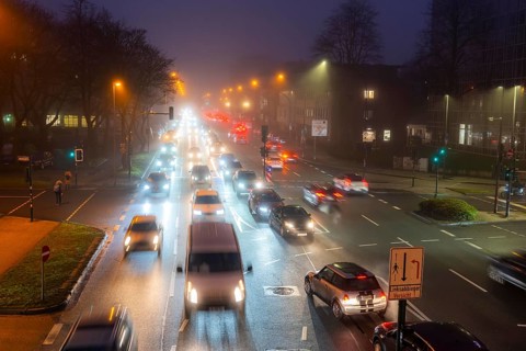 Dense fog, with visibility sometimes less than 100 metres, city centre traffic at rush hour on