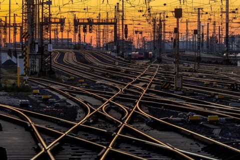 Track apron with trains, rails, points, pylons and signalling systems. Infrastructure at the main