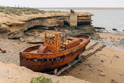 Abandoned supply boat, abandoned Swift factory, The Swift refrigerator in Puerto San Julián, Puerto