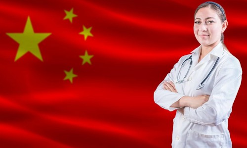 Female doctor on China flag. Doctor with crossed arms on China flag. China Health and Care concept