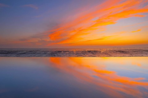 View of a tidal flat in the Wadden Sea at low tide at sunset, National Park, Unesco, World Natural