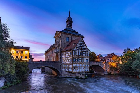 The Old Town Hall in the river Regnitz at dusk, Old Town of Bamberg, Upper Franconia, Bavaria,