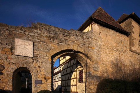 Grave gate with sundial, Schiller town of Marbach am Neckar, evening light, Baden-Württemberg,