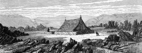 Grass-covered wooden church in Iceland, grass sod house, rocks, volcanic rock, volcanic landscape,