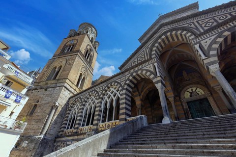 Italy, Amalfi town colorful architecture in historic city center with churches and old buildings,