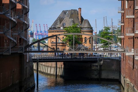 Hamburg, Germany - Warehouses in the Speicherstadt, harbour police station behind