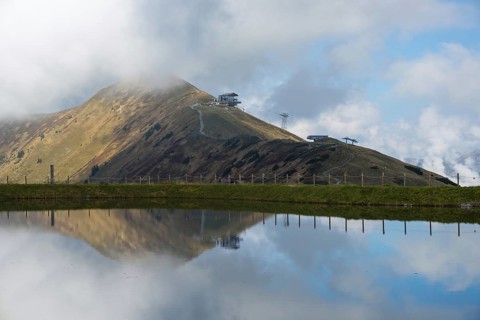 Artificially created lake, snow pond, feeds the snow cannons that completely cover the slopes of