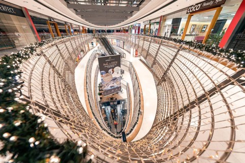 Large shopping centre with escalator and festive decorations, Stuttgart, Königsbau Passage,