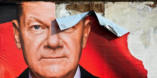 Partially destroyed large poster for the 2025 federal election by the SPD with Olaf Scholz, Witten,