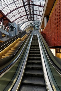 Empty escalator, station concourse, historic Antwerp-Centraal railway station, Antwerp, Flanders,