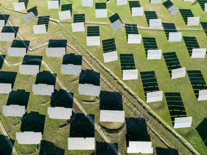 Rows of solar panels at a photovoltaic plant near town of Espejo. Aerial view. Drone shot. Córdoba