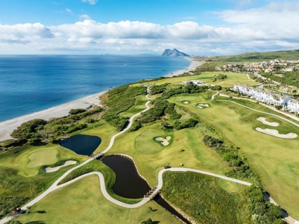 The La Hacienda Links Golf Resort at the Mediterranean Sea with the Rock of Gibraltar (British) in