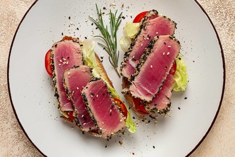 Sandwiches with fried tuna fillet, sesame, breakfast, top view, homemade